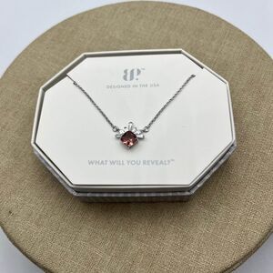 Bomb party lab created pink spinel and CZ silver tone necklace